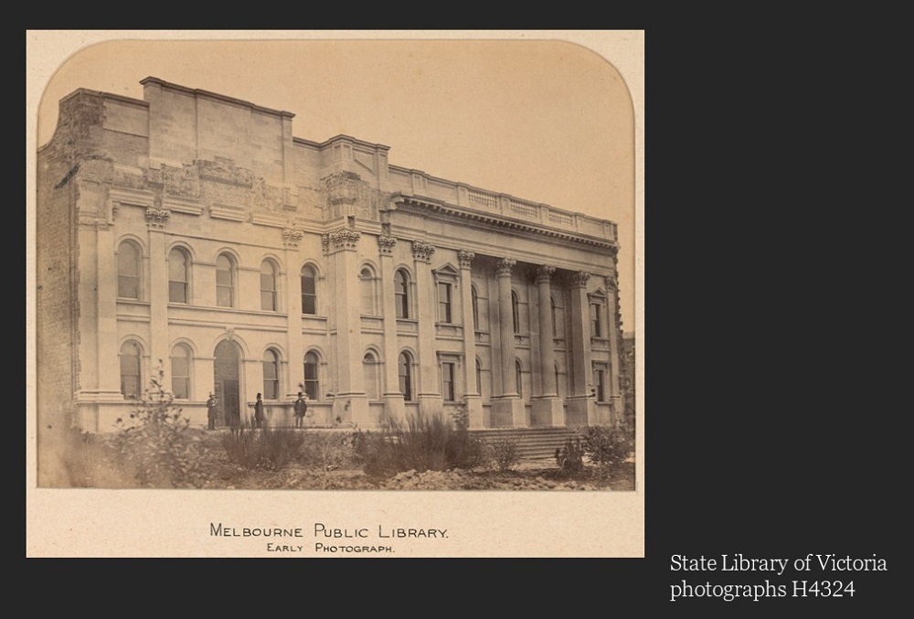 An image of the Melbourne public library from the early 1900s. It has a lot of windows and a portico. State Library of Victoria Photographs H4324